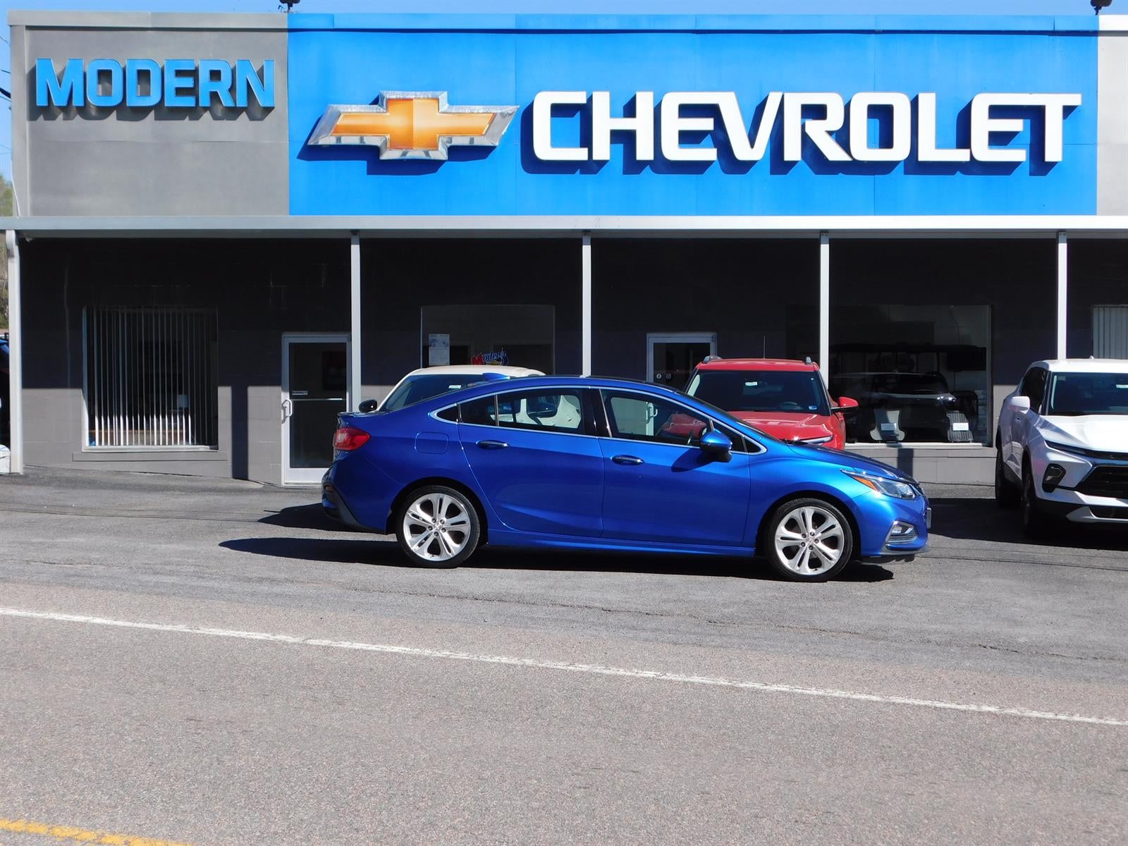 2016 Chevrolet Cruze Premier in Kinetic Blue Metallic — front three-quarter view