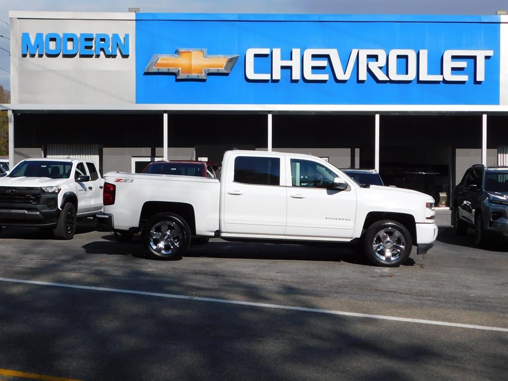 2018 Chevrolet Silverado 1500 LT in Summit White — front three-quarter view