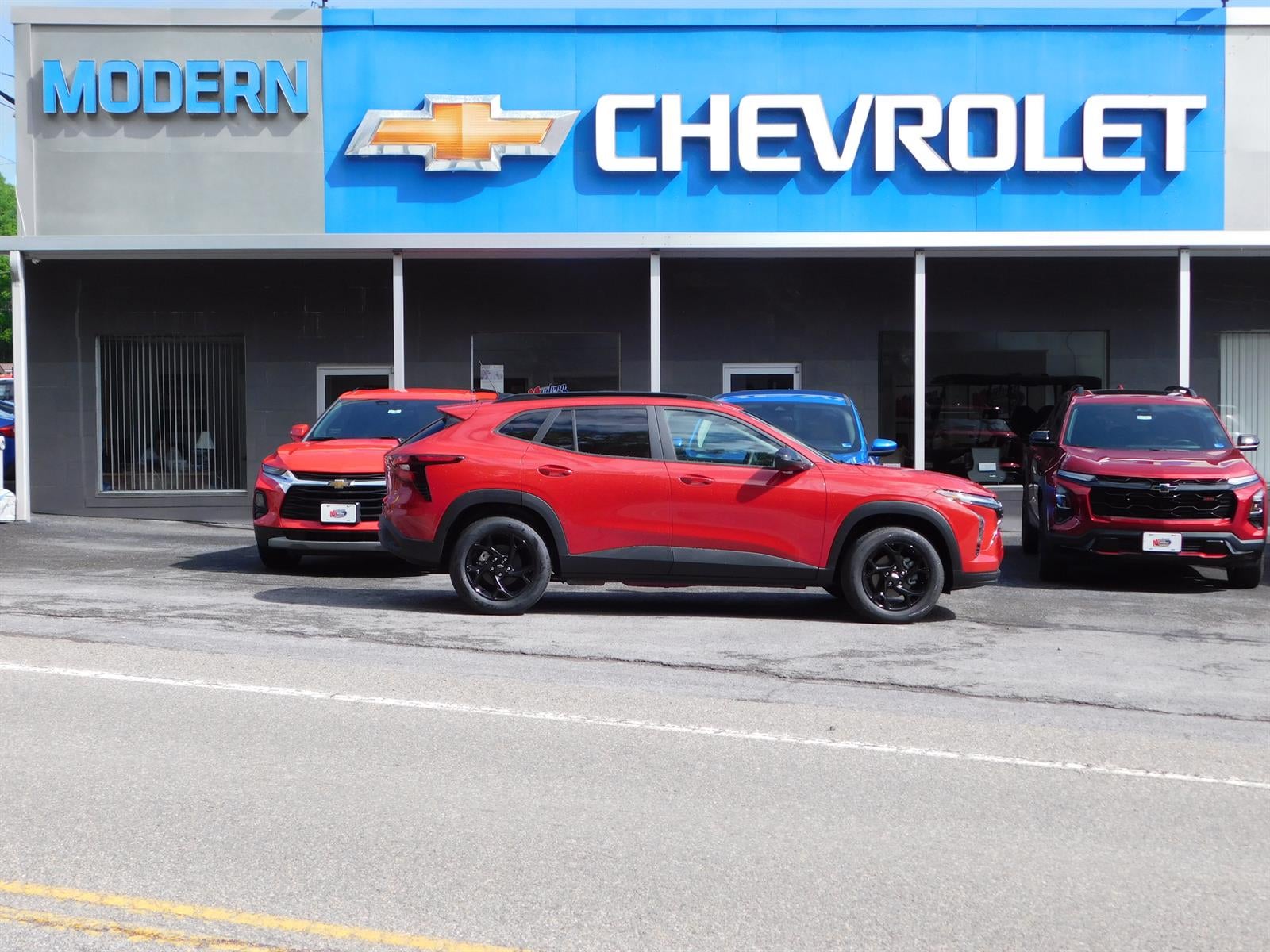 2026 Chevrolet Trax LT in Apex Red — front three-quarter view
